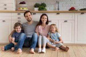 Family On Kitchen Floor