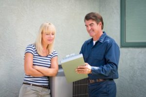 Woman Speaking To Contractor